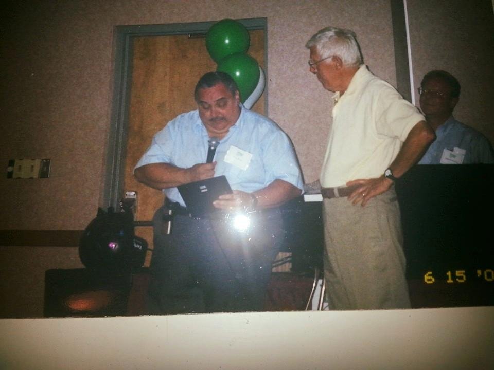Mr Snow being presented with a plaque thanking him for being the best principle ETC: The plaque was presented to him at the 2002 Hickory Hill reunion. After he spoke there wasn't a dry eye among the 68 attendees.