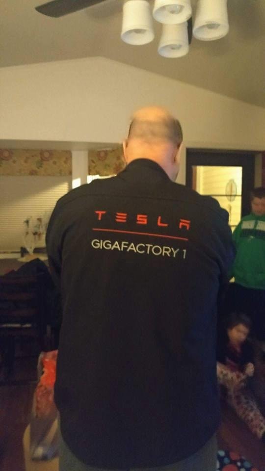 Jim Tesla work jacket sharp looking crew he's doing good has lost 150 pounds in two in a half years.hes doing it right.