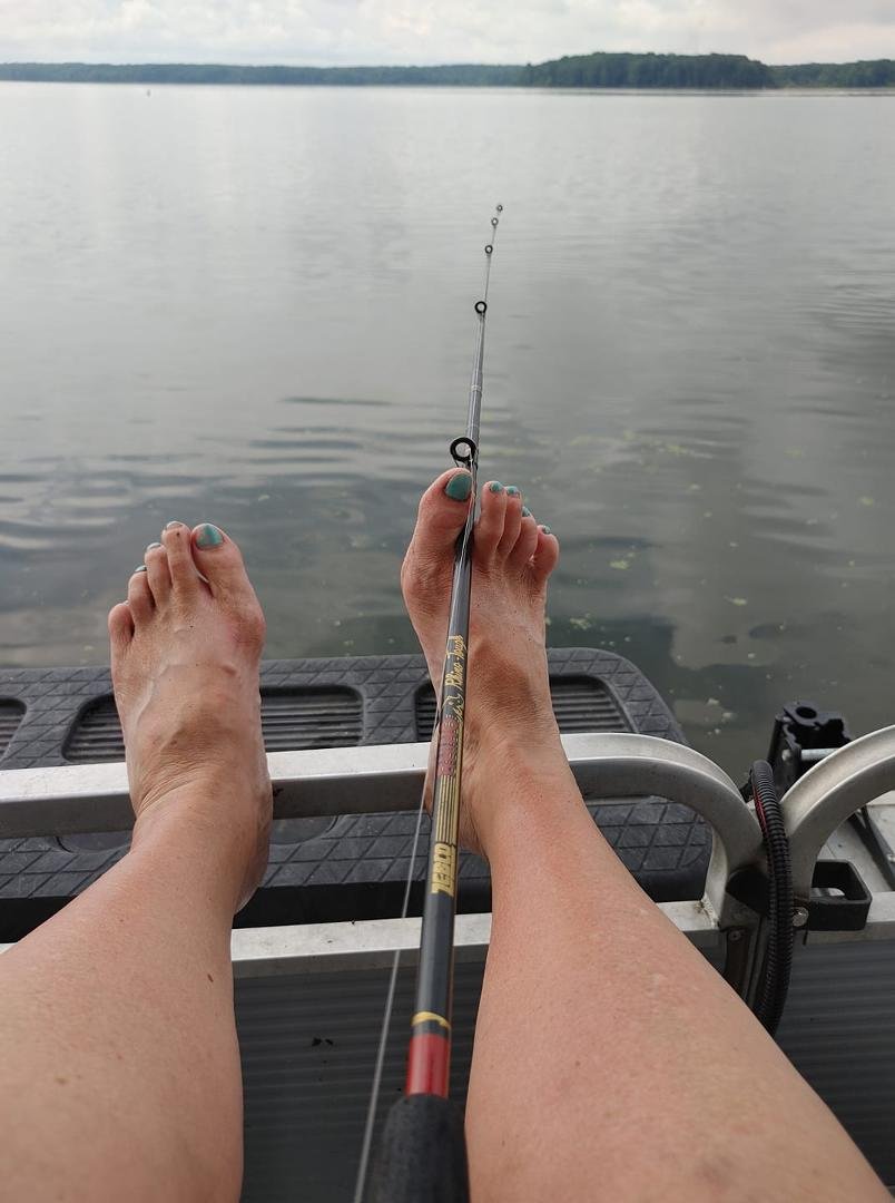 Great fishing day! We have toes for a reason. I do have a rod holder right next to me. Lolol