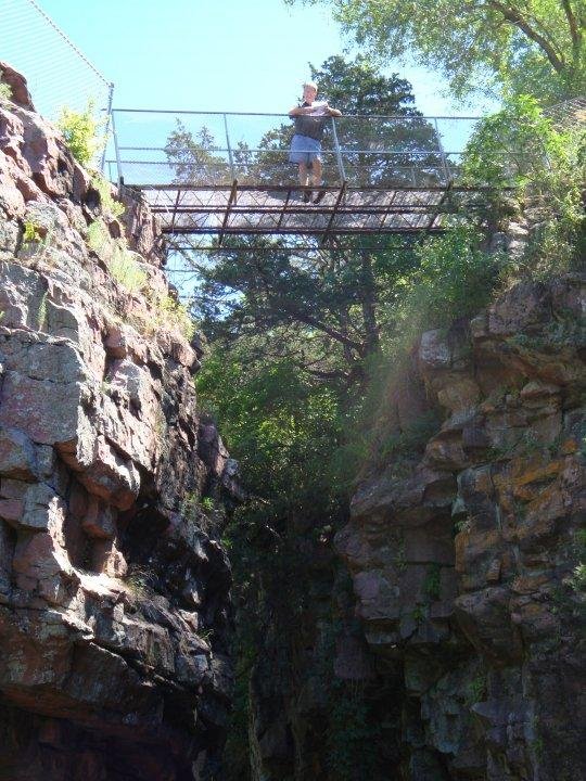 The folks in South Dakota say that Jesse James had is horse leap over this small gorge to avoid a posse. there is a spot about 1/4 mile up one could walk a horse through a stream to the other side........