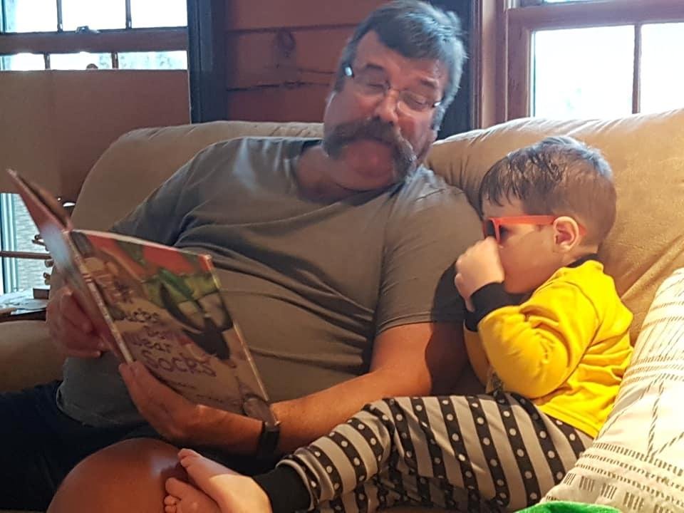 My younger brother,Jame Grabham,is with Fritz at home storytime.