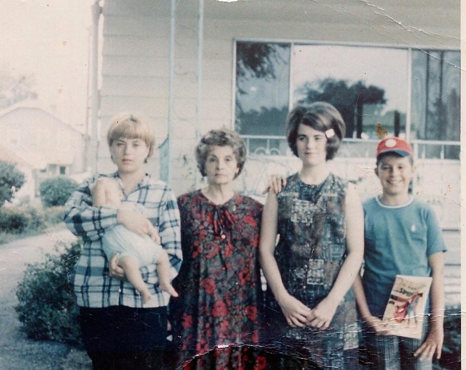Me in a trance I think...Gram and Megan and Reed with Baby Phillip in 1965 in front of 39 N Hague