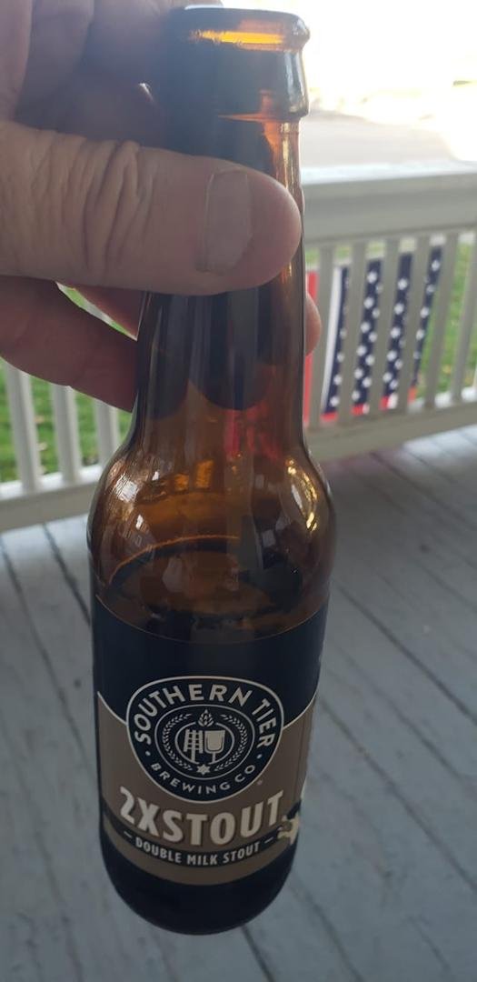 after working outside putting everything away mowed the lawn time for a beer and a smoke on front porch😎