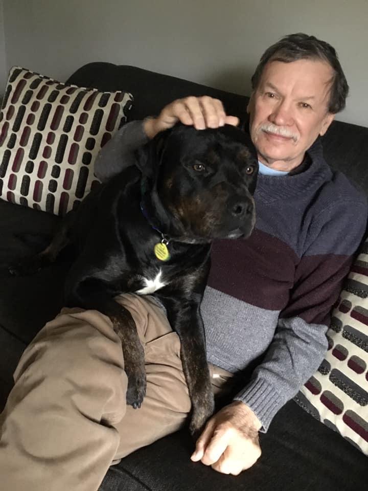 Relaxing with Rocky.  Yup, he got on the couch.