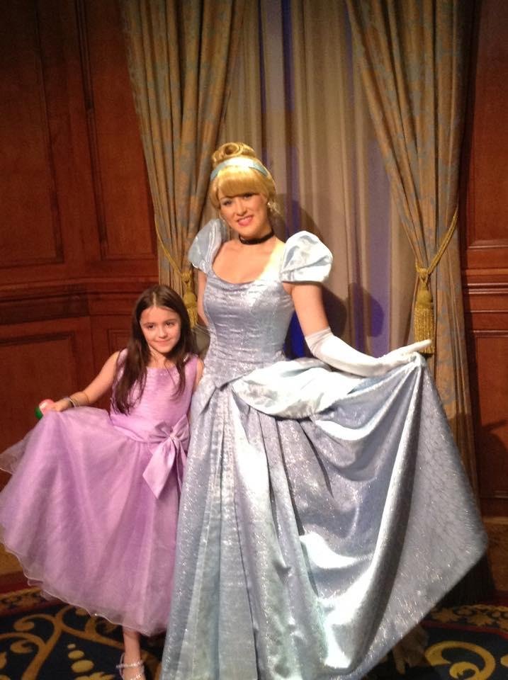 Our granddaughter and Cinderella at Disney.