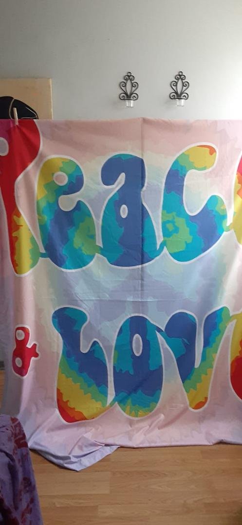 Just what we need these days Peace and Love. This tapestry is huge and could be used for many purposes. Message for details!