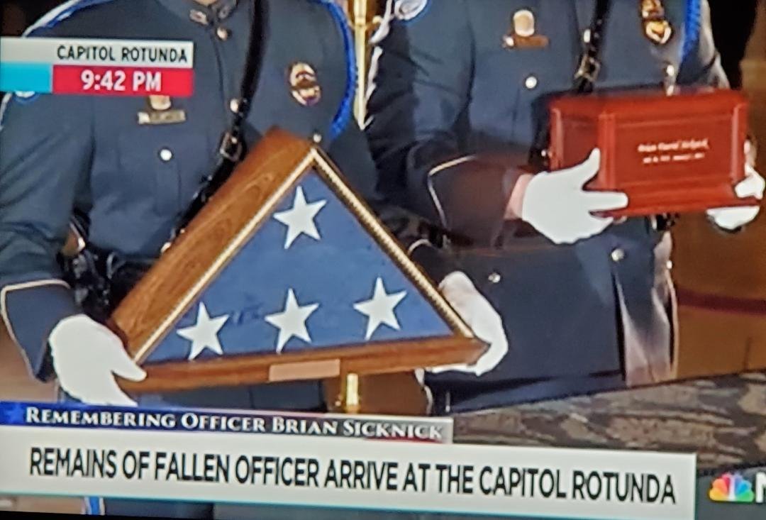 Paying respects to officer Brian Sicknick, In the United States Capitol... Ironically, the same place he was murdered by Trump and his suppoerters.