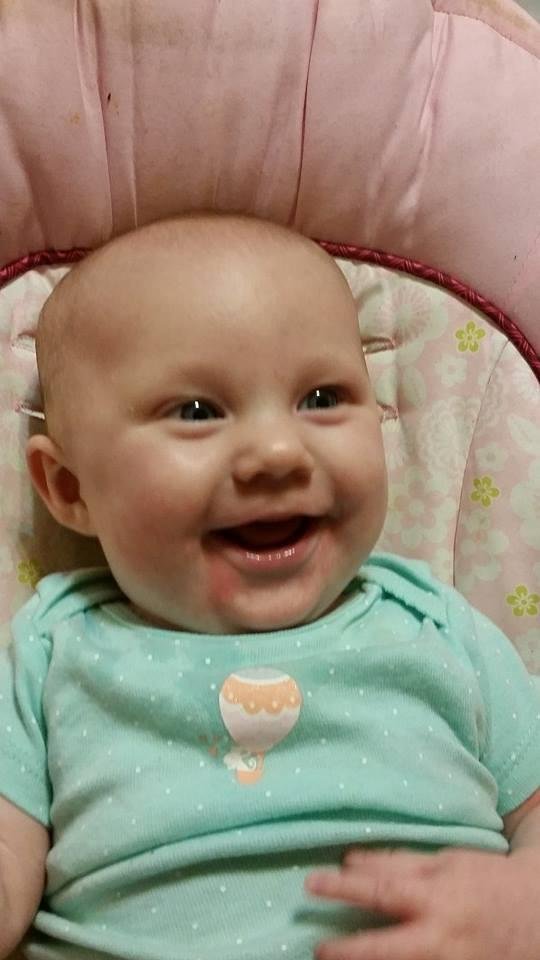 She is working a cutting her 1st tooth.
