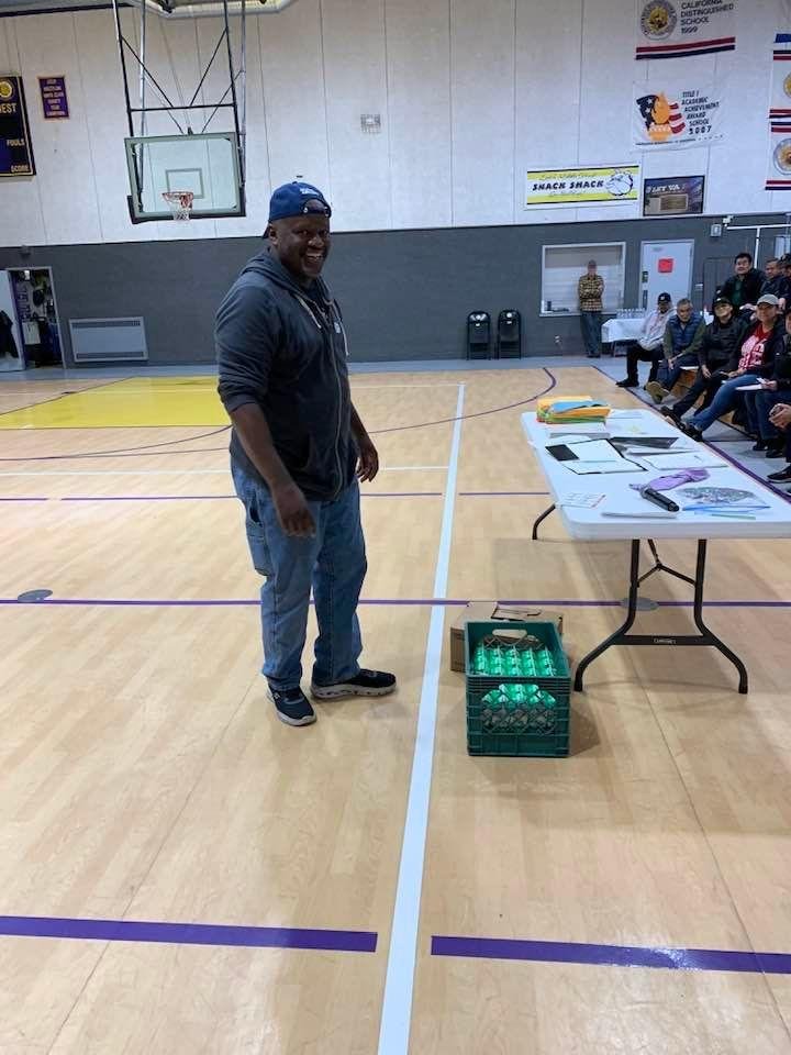 A custodian from Evergreen school District, getting ready to demonstrate the proper method for safe lifting. Congratulations on an excellent performance.