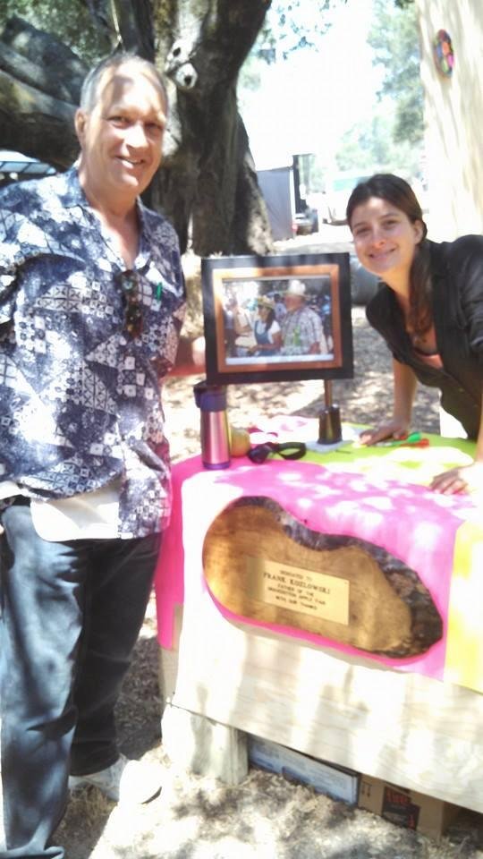 Uncle Frank started the Apple Fair 41 years ago. This is a picture of his son Martin and Jessica  his granddaughter holding the plaque he received for his contribution to the Sonoma County Fair