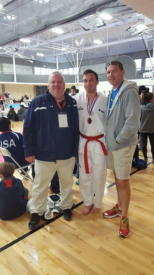 Drew with His Coach and His Dad.