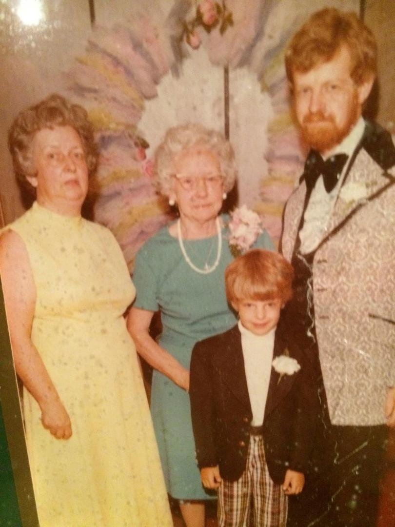 Four generations of the family. Mark as a handsome young man and me thinking that was a good look.