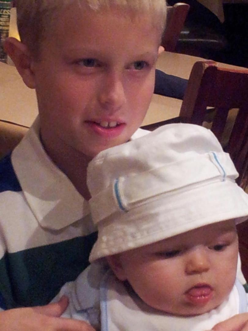 Forest's turn to hold his pal Logan.