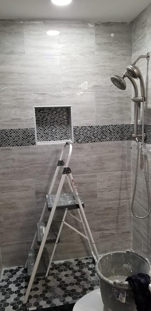 Just finishing up new tile bathroom fixture next job what an incredible soundproof room.. Boston Foreigner and Ozzy got me going