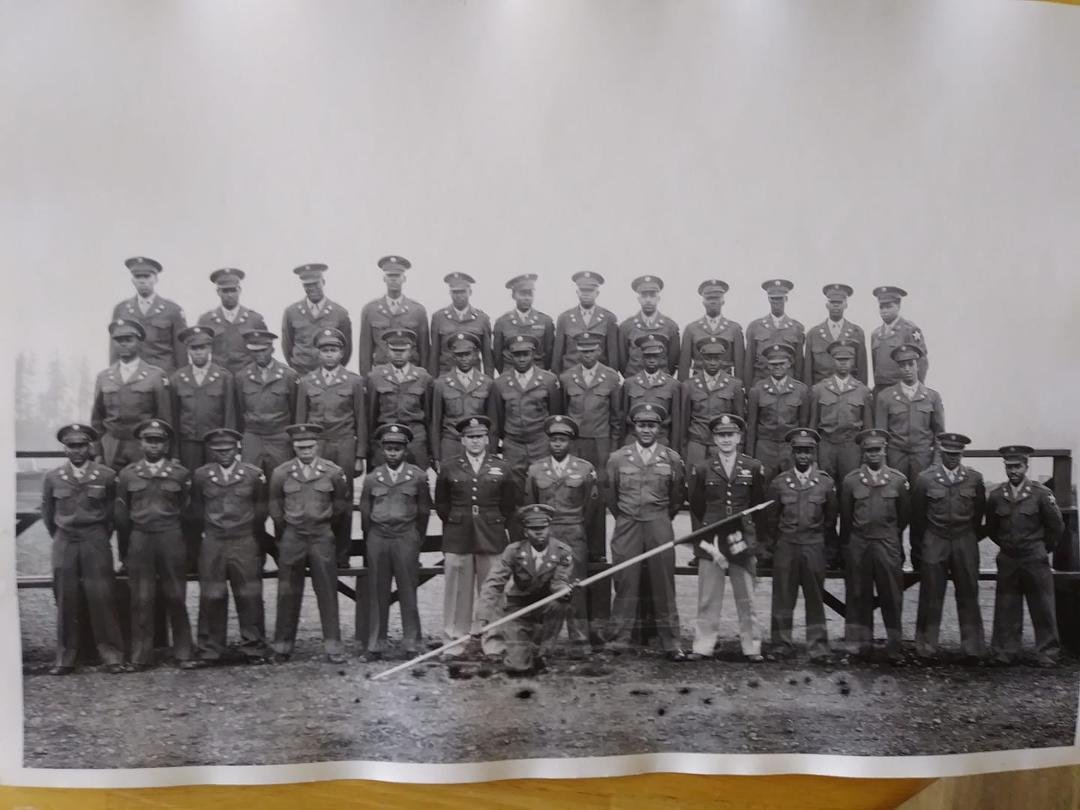 This is a picture of an all-Black unit that my Father, Noall Streeper, commanded at Fort Lewis, Washington, following World War II. The banner has 25, B and the crossed rifles of the Infantry. Where can I find more info on