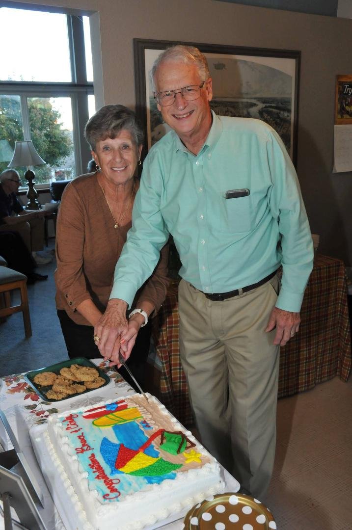 Bruce and Cindy cut the cake