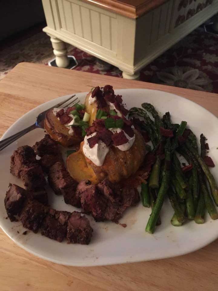 First attempt at London broil with loaded hassleback potatoes and asparagus.