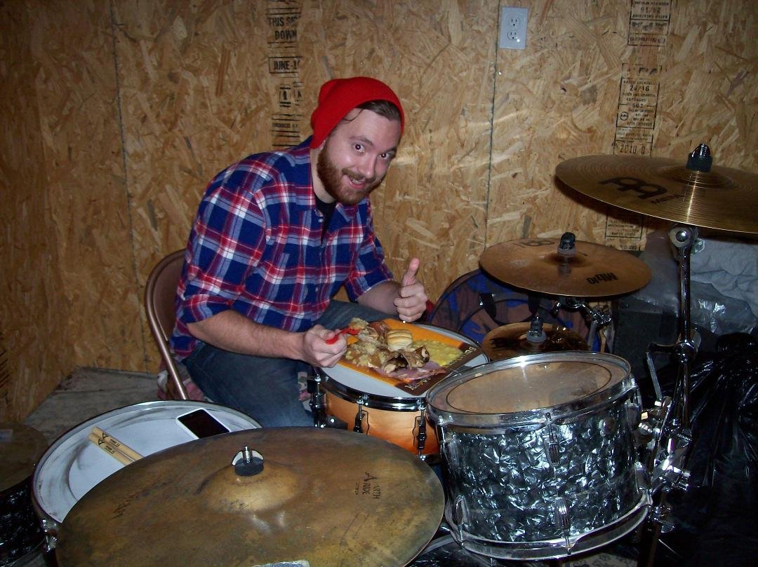 Martin doesn't even leave the drums to eat Thanksgiving dinner