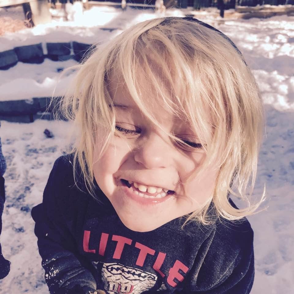 Parker playing in the snow this morning.!