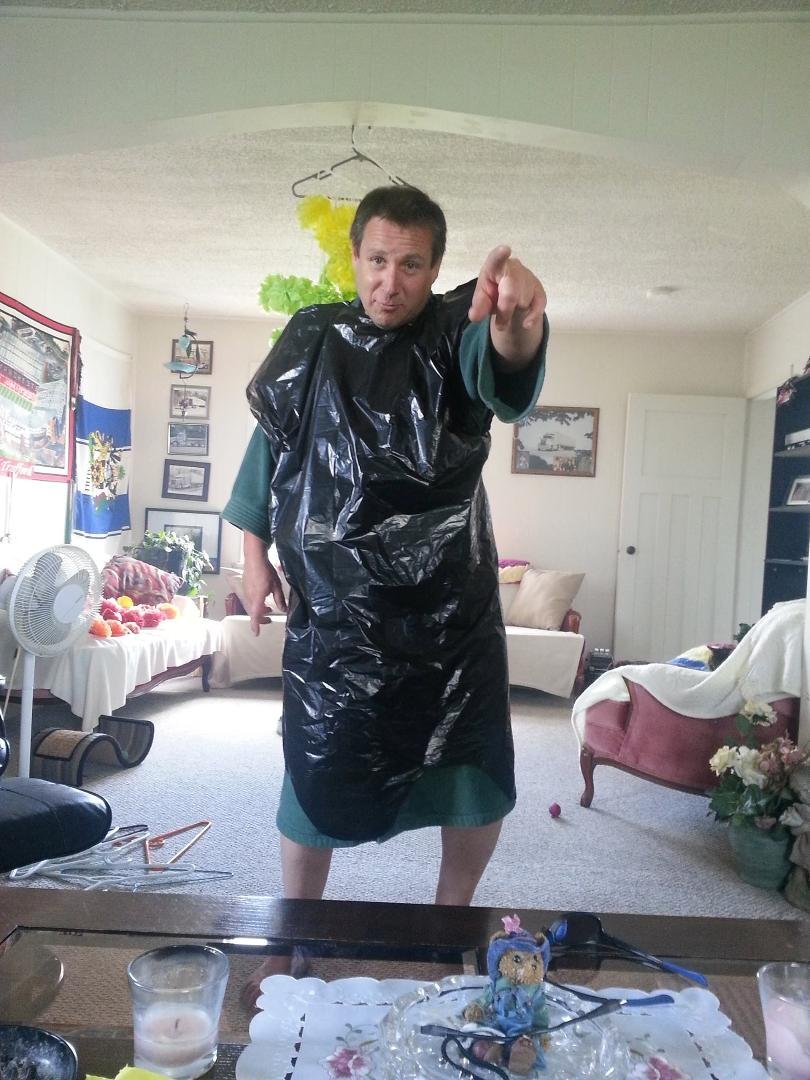 all dressed up and ready to bath  the cat