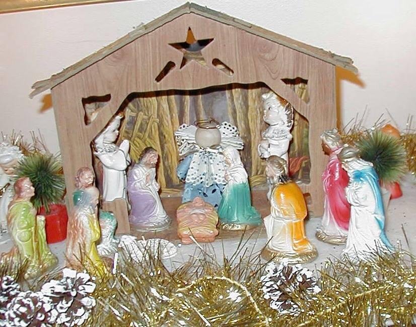 I saw a wonderful display of nativity sets today.  Beautiful, unique, large, small...made of many different materials and from all parts of the world.  There was one there very similar to the one I have displayed for more t
