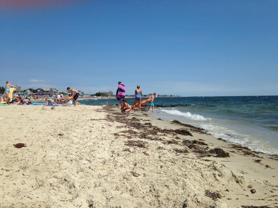 It may appear to be a lazy Saturday afternoon on the beach in Falmouth Heights, but to the left of me the town is setting up for their annual 10K road race tomorrow with 15,000 runners and multiple road closures. Talk about