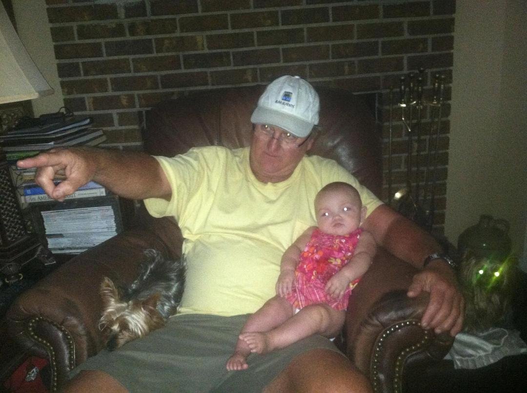 Papa explaining to Avaree why his team lost yesterday.