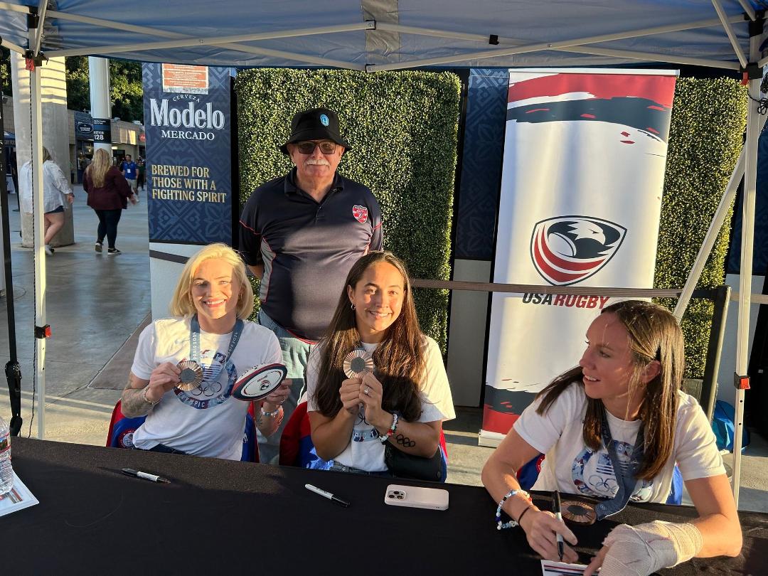 Had my picture taken with three members of the bronze medal women’s sevens rugby team at the USA vs Canada game. The USA Eagles won!