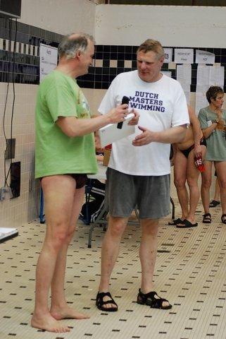 Official Coach, Fred Nelis, and Mr Michigan Masters, Skip Thompson in green