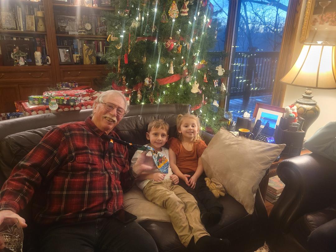 Steve with our two great grandkids Harrison and Charlotte