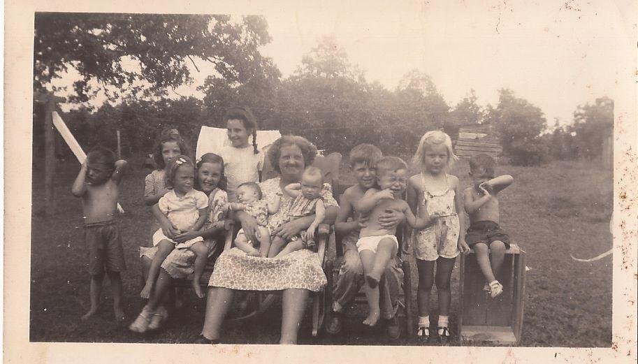 Grandma Isabell and a few of the grandkids at our farmhouse in the country.