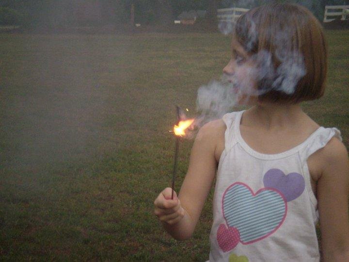 Libby likes the sparklers, but not the smoke