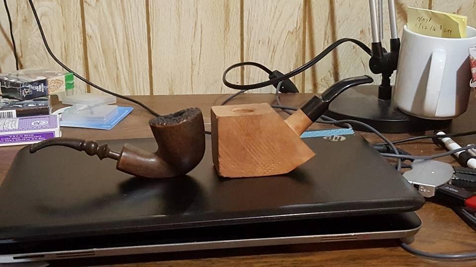 On the right is an early birthday gift I bought my self,  a carve your own pipe. The pipe on the left is my favorite that got me through grad school, it was unfinished and stained it self with use. The new one will too once