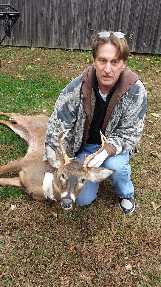 Doug and his first deer of the season.