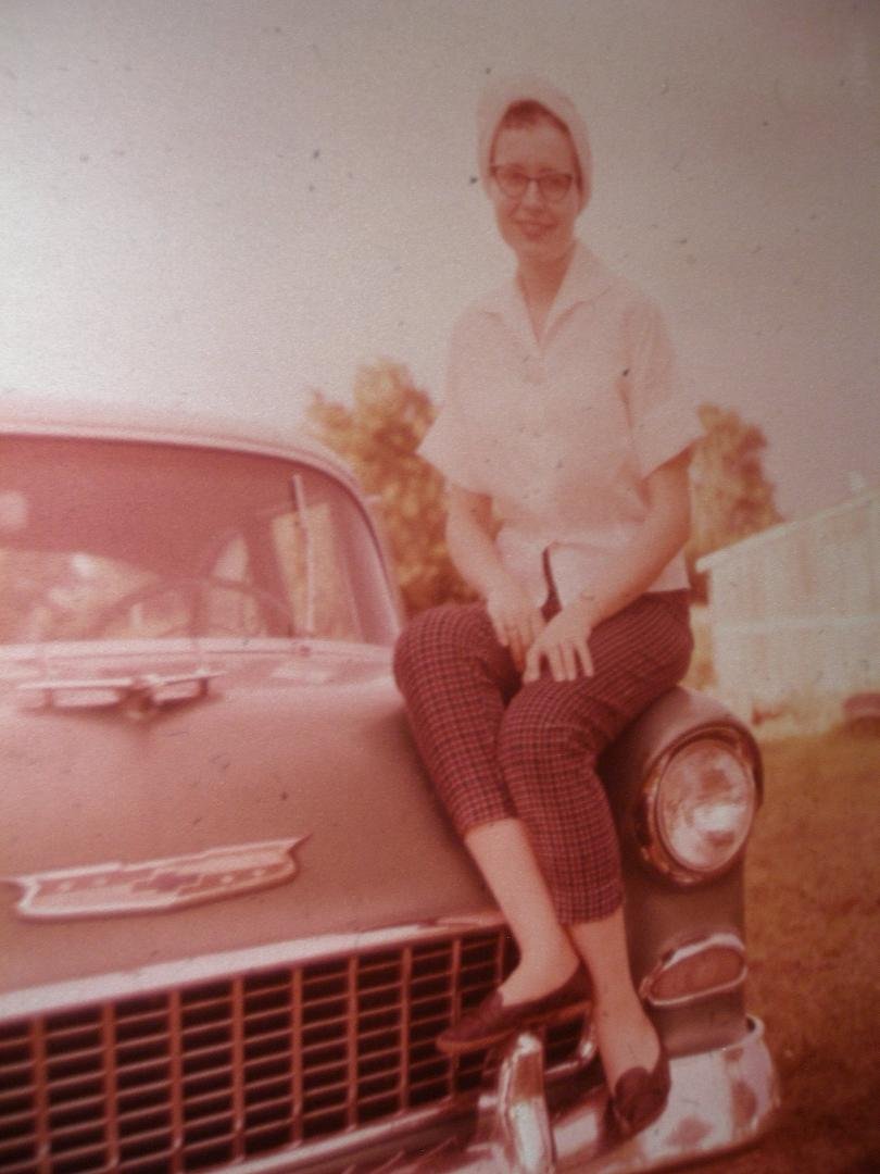 Throwback Thursday. This was in the summer of 1962 before we got married...I think July 4, but it's been a LONG time. I'm sitting on my 55 Chevy Tudor/post. The colors have faded over the years. The car was 2-tone green.