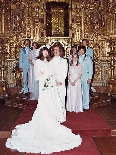 With all the attendants after the wedding, by the gold gilt altar in the St. Francis of Assisi chapel at the Mission Inn, Riverside, CA.