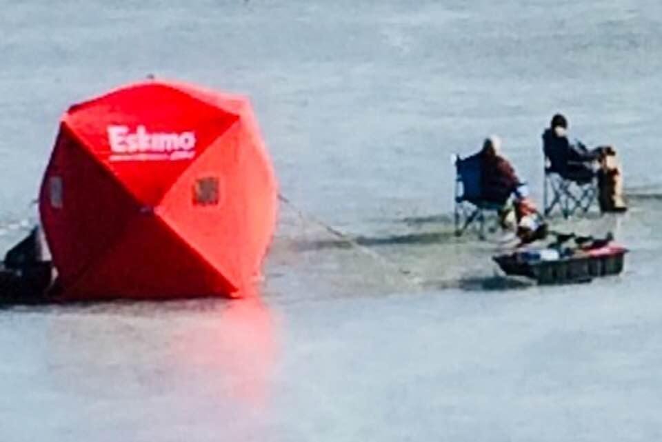 Eskimos on the lake.