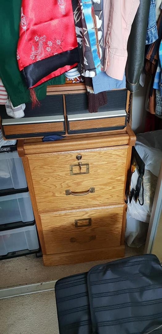 Wooden File Cabinet with a lock.