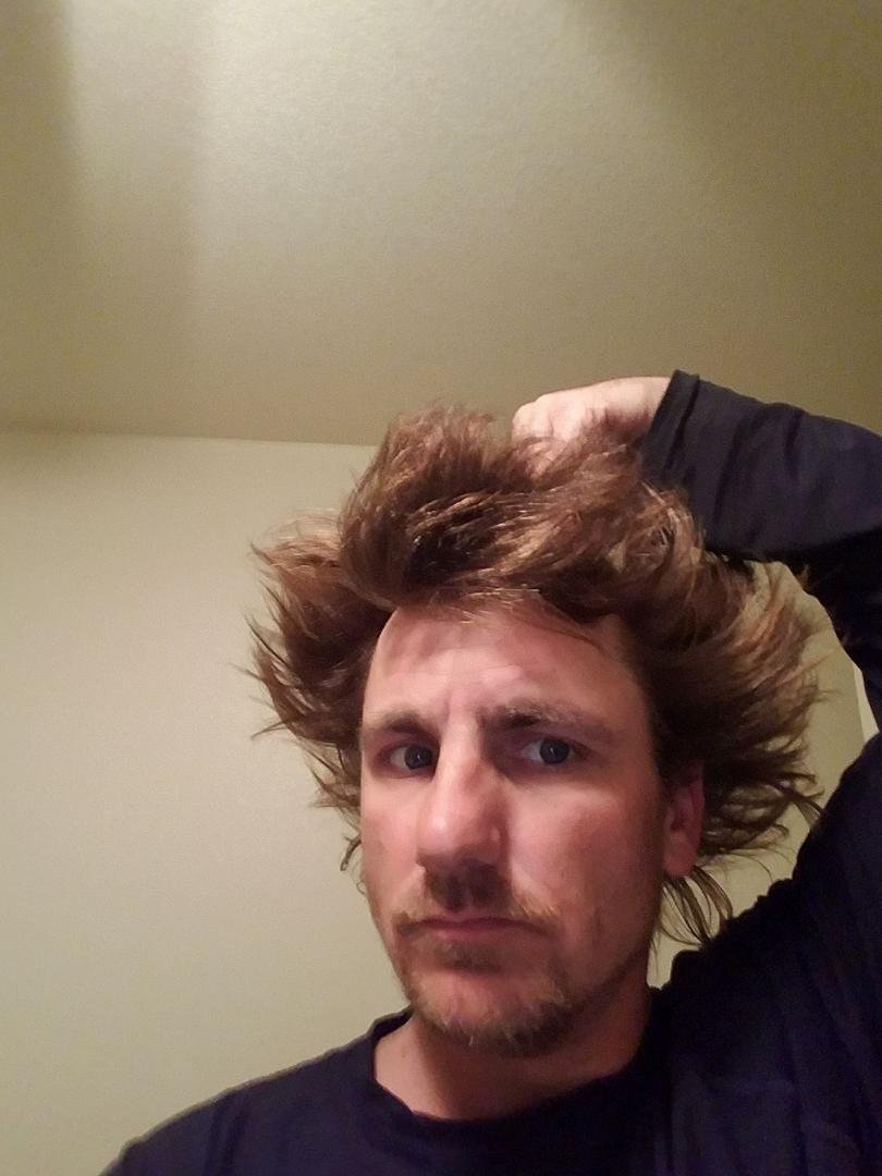 So..... here it is. I dont like asking ppl what to do or realy give a damn about ppls opinions but ill ask anyways. Should i cut my hair? The picture does it no justice its longer then it seems.