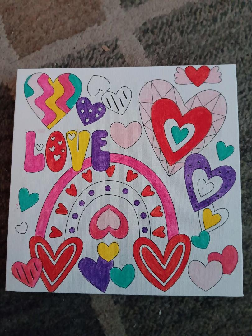 Sitting in my recliner, watching TV while painting a Valentines canvas for my window... doesn't get better than this while staying warm as it's -12 outside with a real feel of -34...lol...