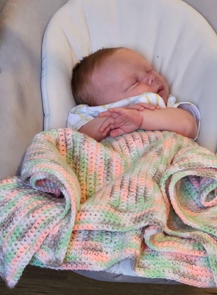 My little grandson at two weeks old. Grandma gets to babysitting almost every day 💗💓💙