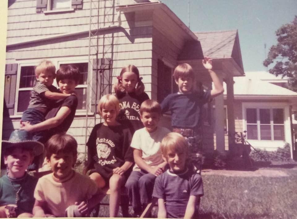 Just a few years ago 😜Neighborhood kids with Chas in your side yard on Main St.