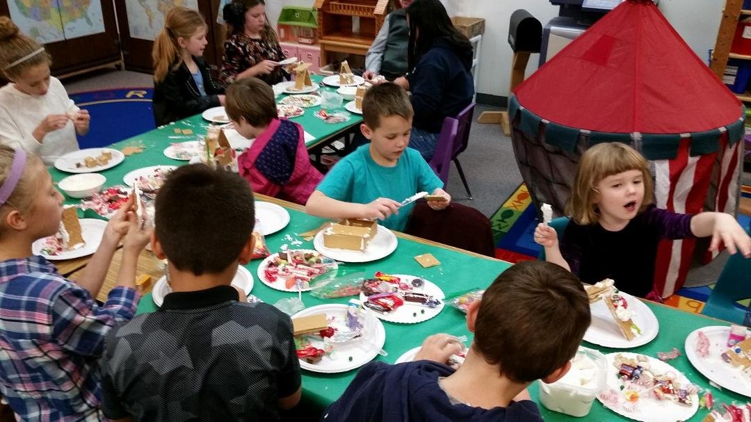 Levi at church making gingerbread houses. Ate more candy than was glued on.
