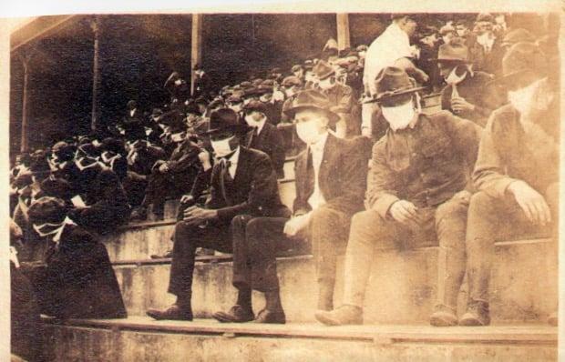 Goergia Tech recognized value of masks at their home game in October 1918!