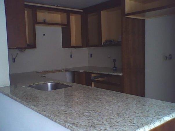 We finally got cabinets and counters in the kitchen and bathroom. Still lots of finish work, etc., but, things are moving along.