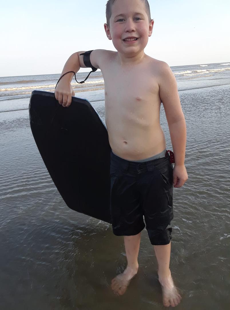 Meanwhile Pawpaw has his toes in the water and my ass in the sand.