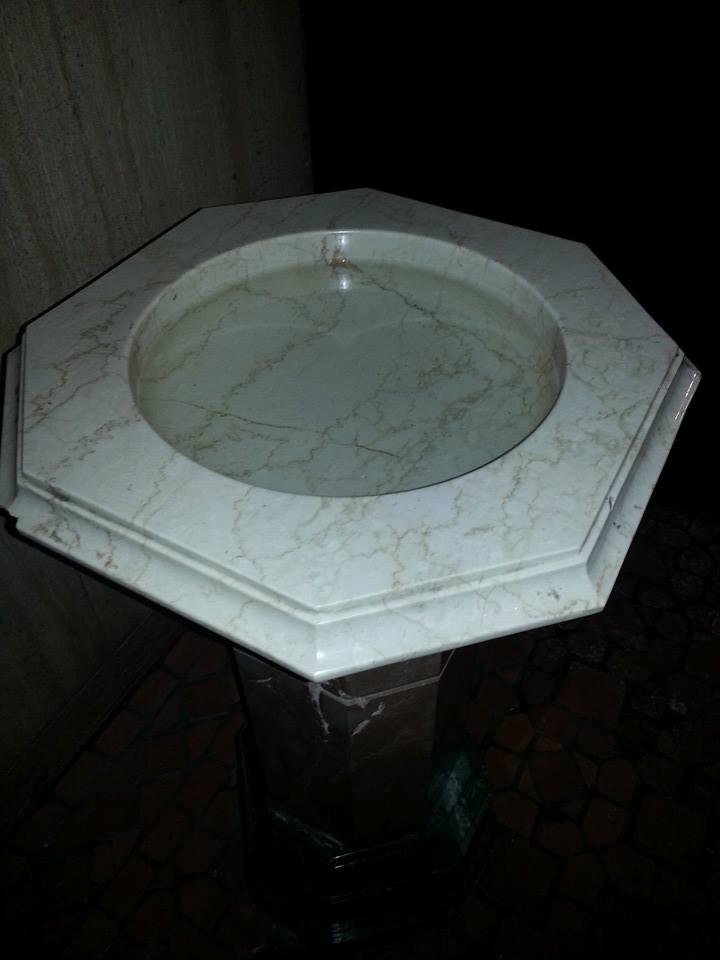 A bowl of holy water they let you take some home