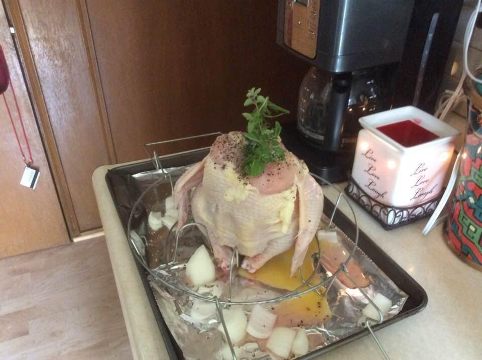 My beer can chicken ready for the grill.  Damn I bought a whole case!