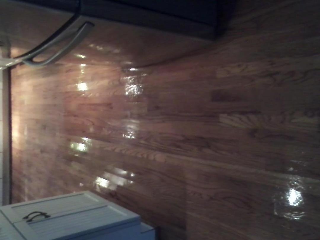 Kitchen floor stripped and redone - CHECK.