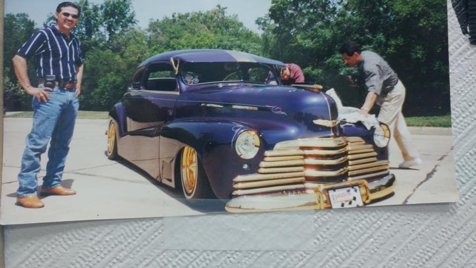 This is me back in the days with the Selena caracacha car won first place in California lowrider car show